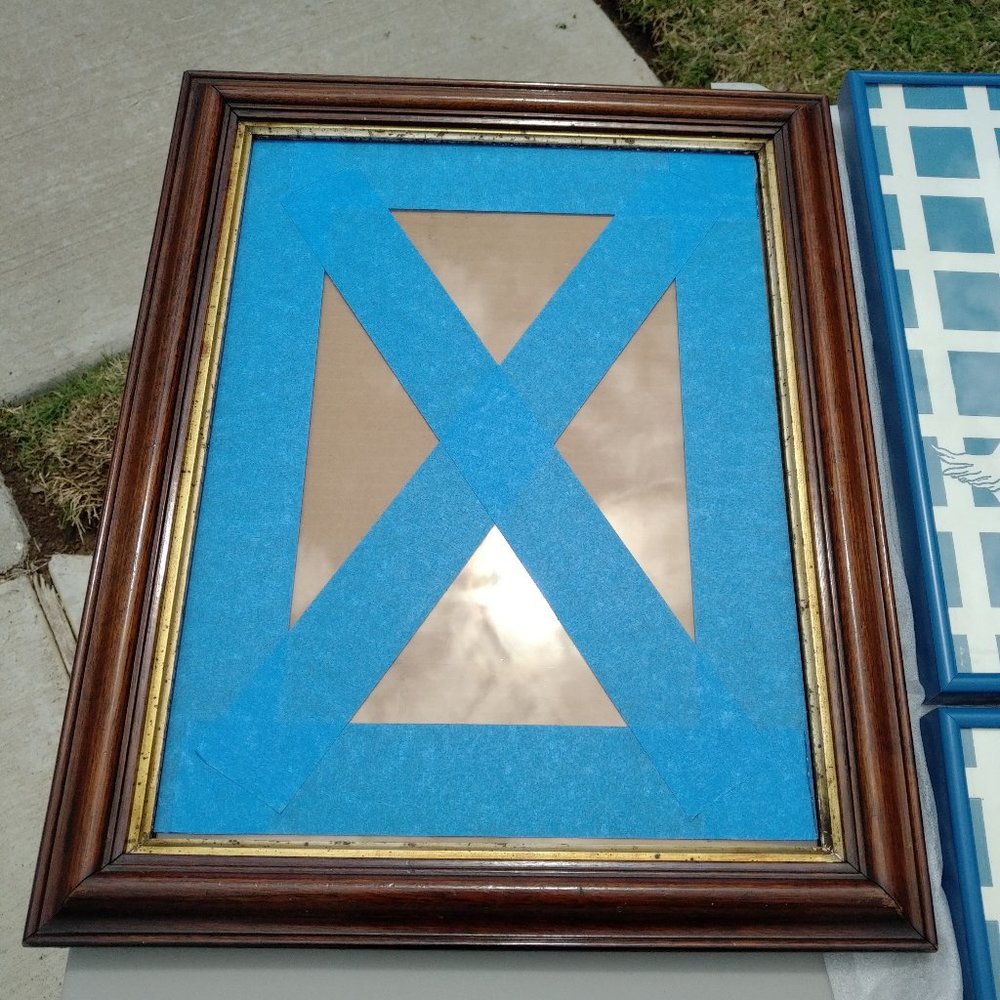 ANTIQUE BROWN STAINED WOOD FRAME WITH DISTRESSED GOLD INNER EDGE AND GLASS